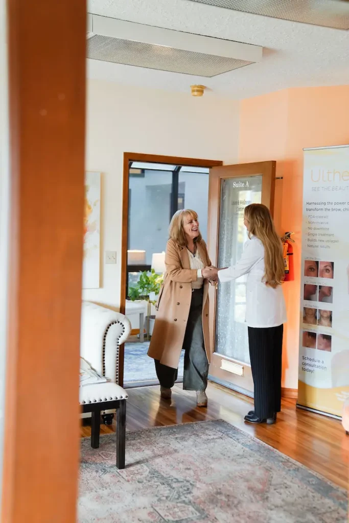 Woman arriving to Laser & Wellness Center, ready to meet for a consultation regarding laser treatment.