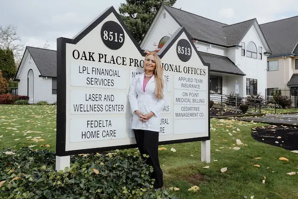 Laser & Wellness founder Ashley Wiese-Mackmer standing outside the office for a landscape shot.