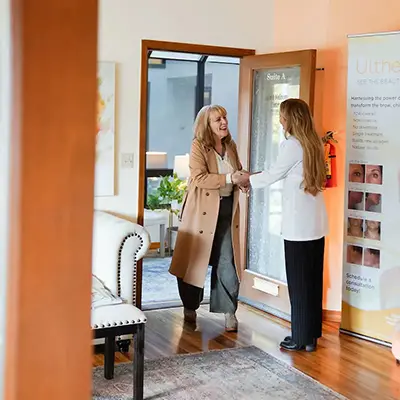 A customer enters Laser & Wellness Center in Vancouver, WA for medical aesthetics and laser treatment service